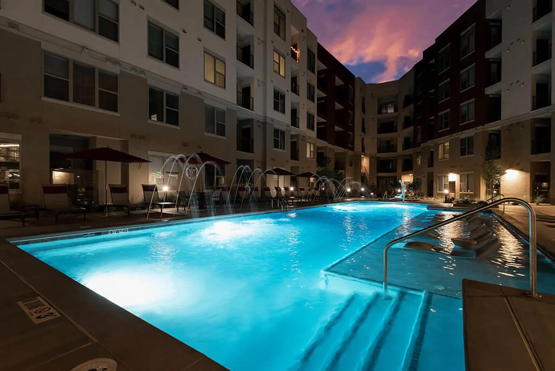 Luxe at Mile High pool at night time